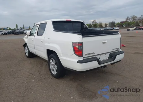 2014 Honda Ridgeline Rtl z USA, uszkodzony, nr VIN 5FPYK1F57EB001037